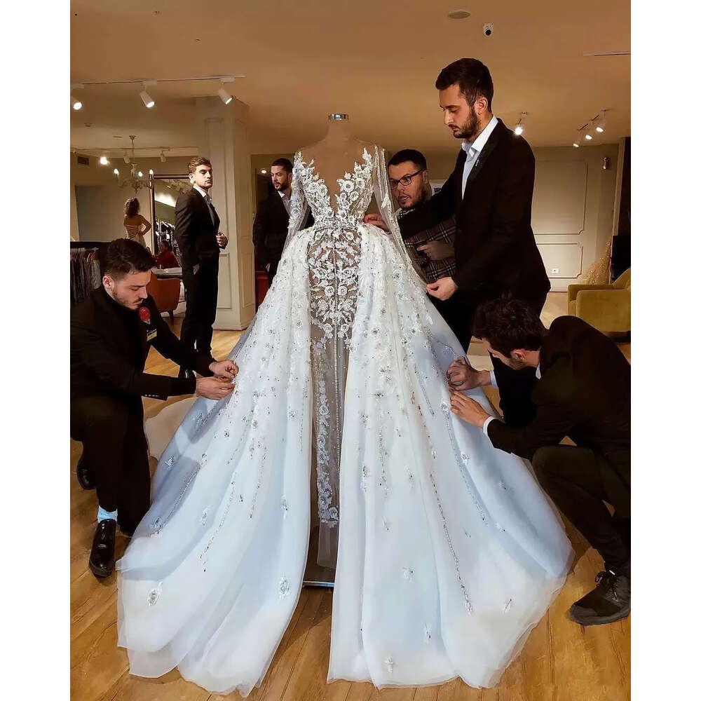 2022 Sparkly Luxurious African With Skirts Lace Beaded Sheath Bridal Dresses Long Sleeves See Through Wedding Gowns