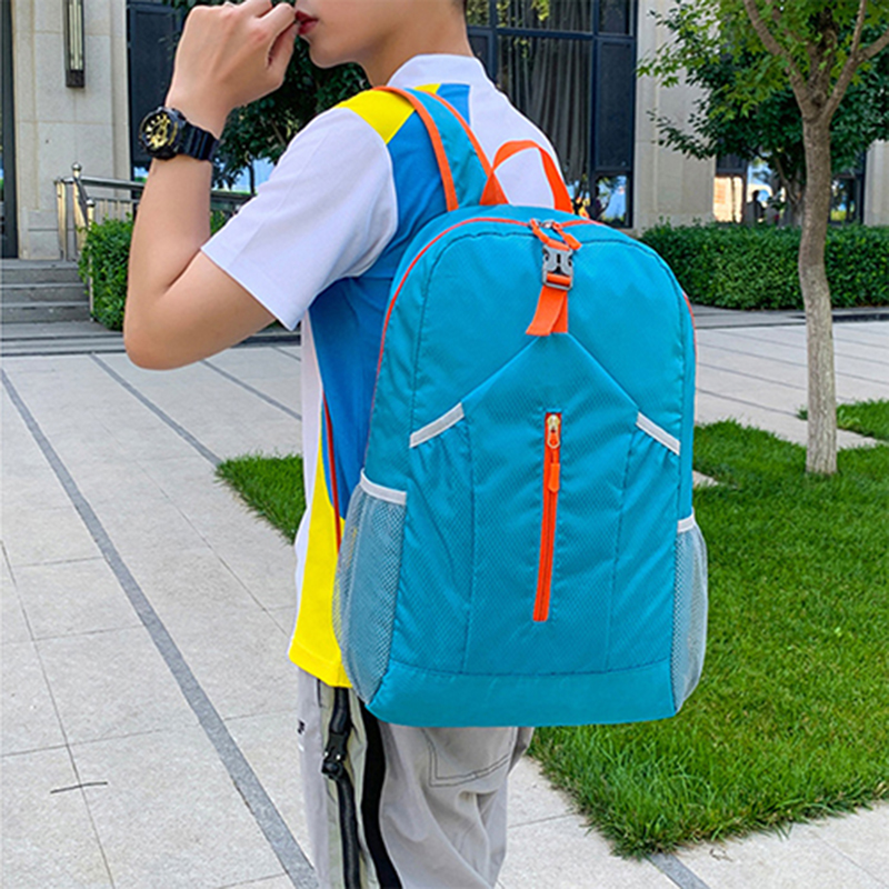 outdoor splash proof sports backpack with foldable storage bag and large capacity backpack