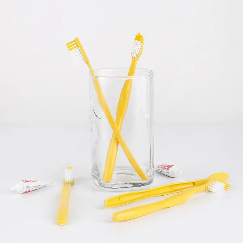 50100pcs Portable Disposable Toothbrush Toothpaste Wash Gargle Suit Cleaning Tool Brush Set For Travel el Bathroom Train 240329