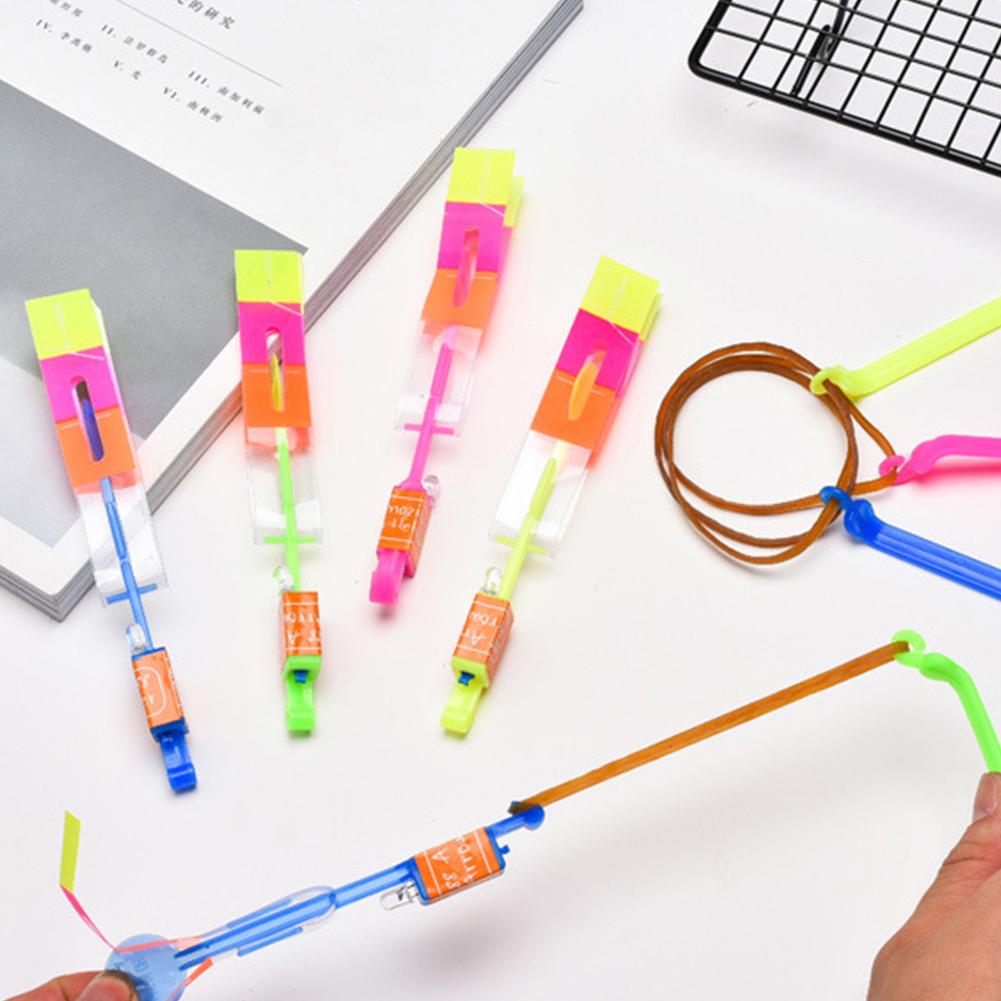 LED Light Catapult Lighting Up Toy Plastic Outdoor Slingshot Flying Game Battery Powered Flying Helicopter Toy for Kids Holiday