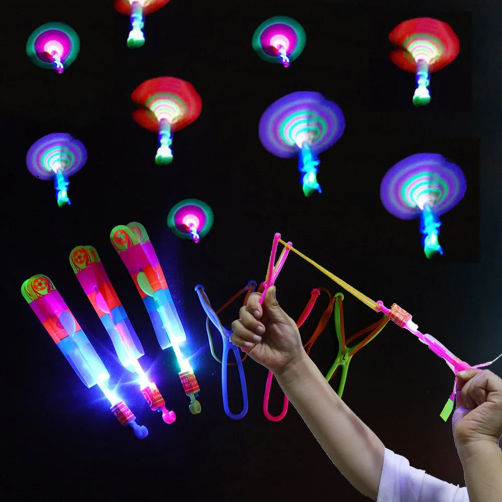 1-10pc Amazing Light Magical Light-Emitting Toy Arrow Rocket Helicopter Flying LED Light Toy Party Fun Gift Rubber Band Catapult