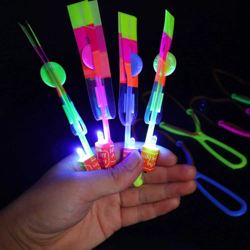 1-10pc Amazing Light Magical Light-Emitting Toy Arrow Rocket Helicopter Flying LED Light Toy Party Fun Gift Rubber Band Catapult