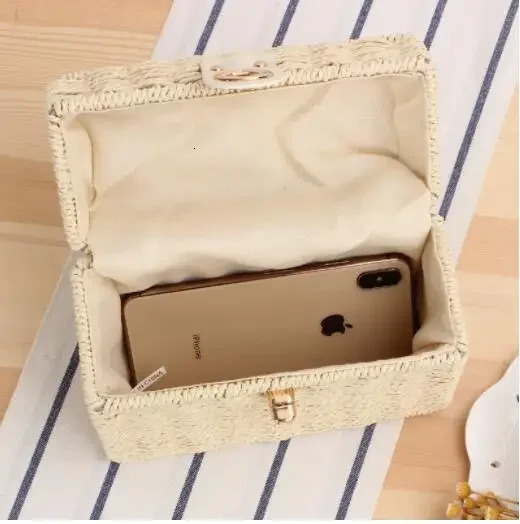 Fashionable square handmade latan womens handbag with paper rope handle durable summer girl beach handbag metal chain cross body 240425