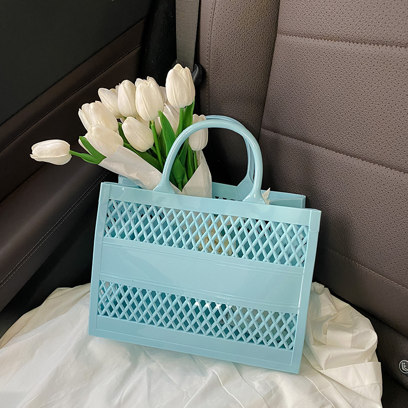 Wholesale ladies clutch bag summer romantic holiday Candy colored beach bag light hollow jelly bag small fresh washing storage basket women's handbag 9944#