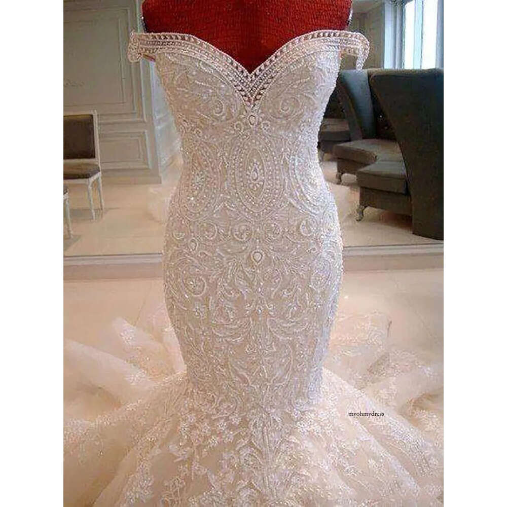 2022 Stunning Lace Mermaid Wedding Dresses Off The Shoulder Sweep Train Appliques Dubai Arabic Style Bridal Gowns Custom Made 0509