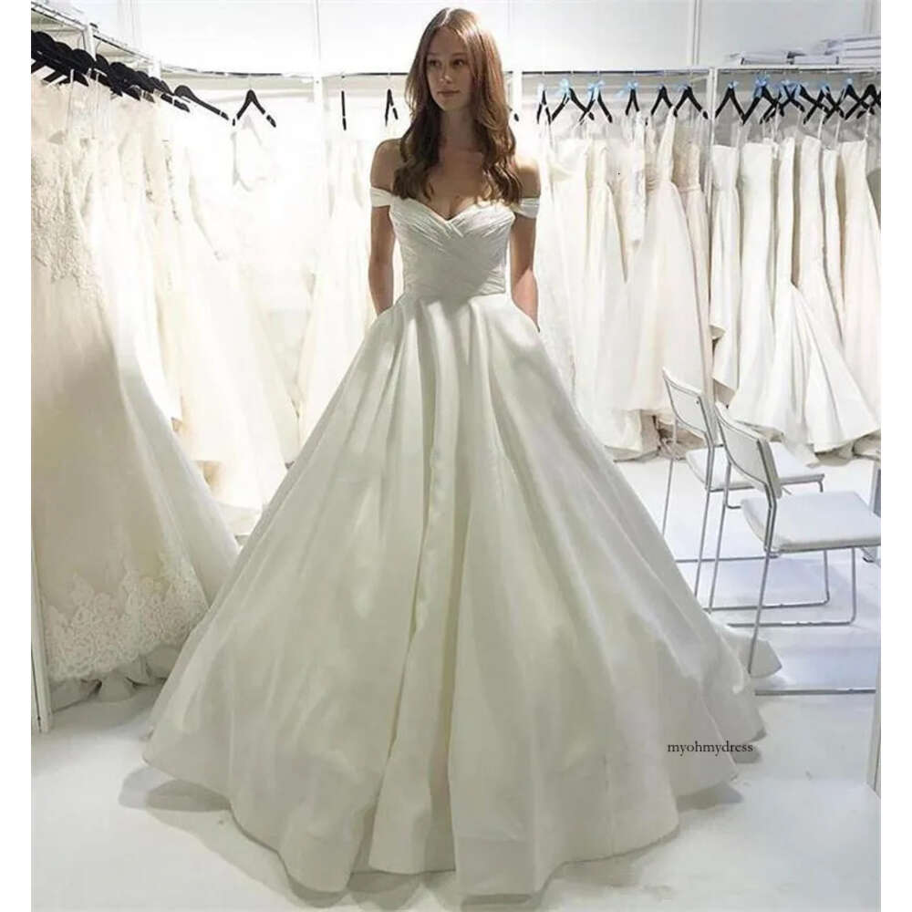 Simple Custom Made Dresses Off Shoulder Short Sleeves With Pockets Arabic Sweep Train Satin A Line Wedding Bridal Gowns Q54 0510