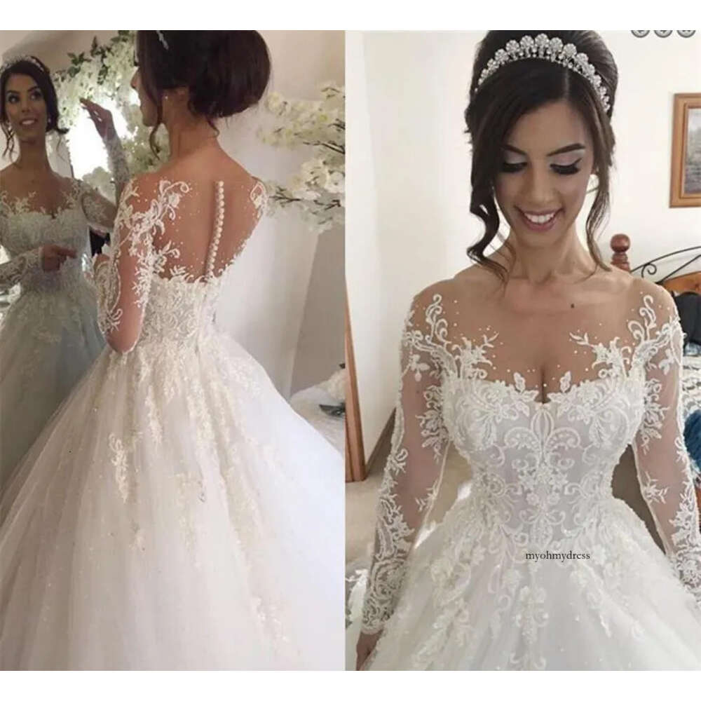 African Illusion Jewel Long Sleeves Wedding Dresses With Beading Appliques Chapel Train Puffy Skirt Arabic Church Bridal Gowns Plus Size Z50 0510