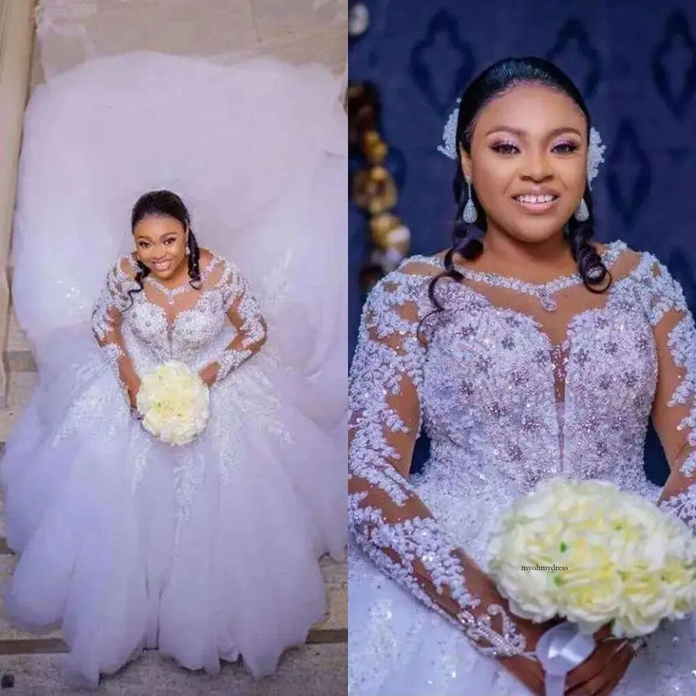 2024 Sexy A Line Wedding Dresses Jewel Neck Illusion Lace Appliques Crystal Beads Long Sleeves Bridal Gowns wedding dress Cathedral Train 0513