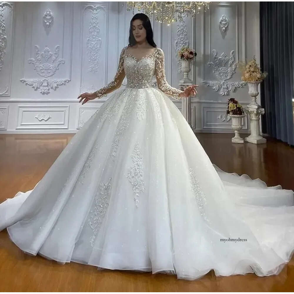 2024 Ball Gown Wedding Dresses Crystal Beads Lace Jewel Neck Illusion Long Sleeves Dubai Arabic Tulle Bride Bridal Gowns Vestido De Noiva Corset Back 