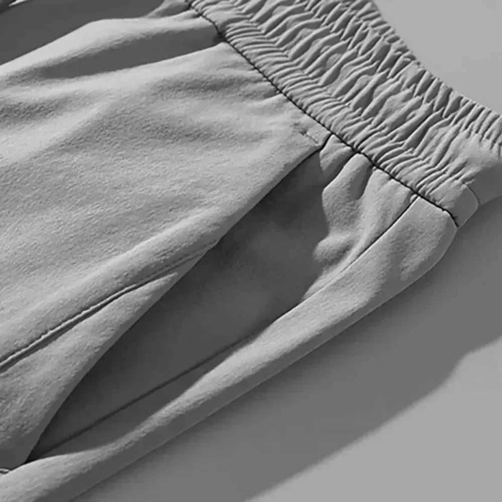 Men's Pants Thin business casual pants outdoor ice silk mens pants 2024 summer new elastic breathable straight leg sports pants Y240513CJCE