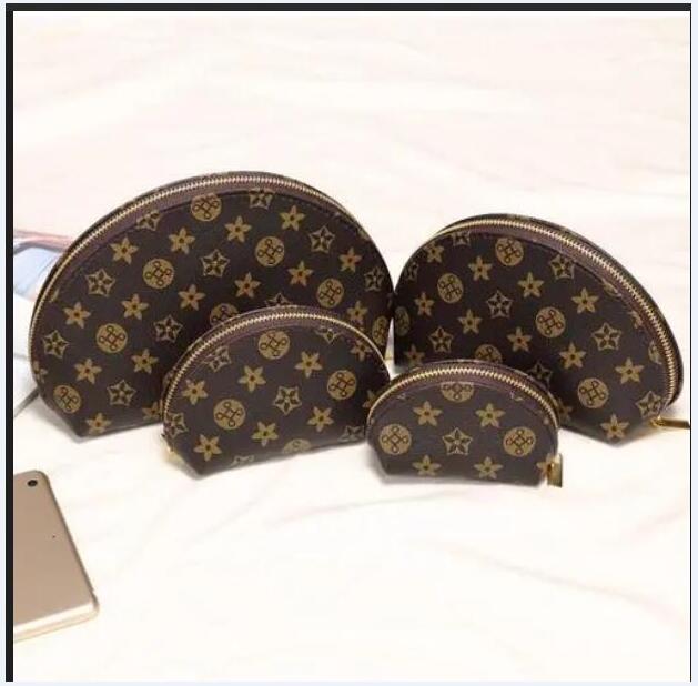 4pcs/set Women cosmetic bags famous makeup bag designer travel pouch make up bag ladies cluch purses organizador toiletry bag 823