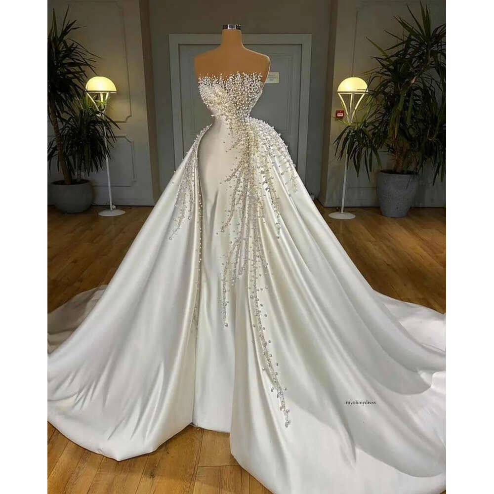 2024 Mermaid Wedding Dresses Bridal Gowns Overskirts Crystal Pearls Beads Strapless Satin Plus Size African Nigerian Fishtail Robe De Mariee Sleeveles