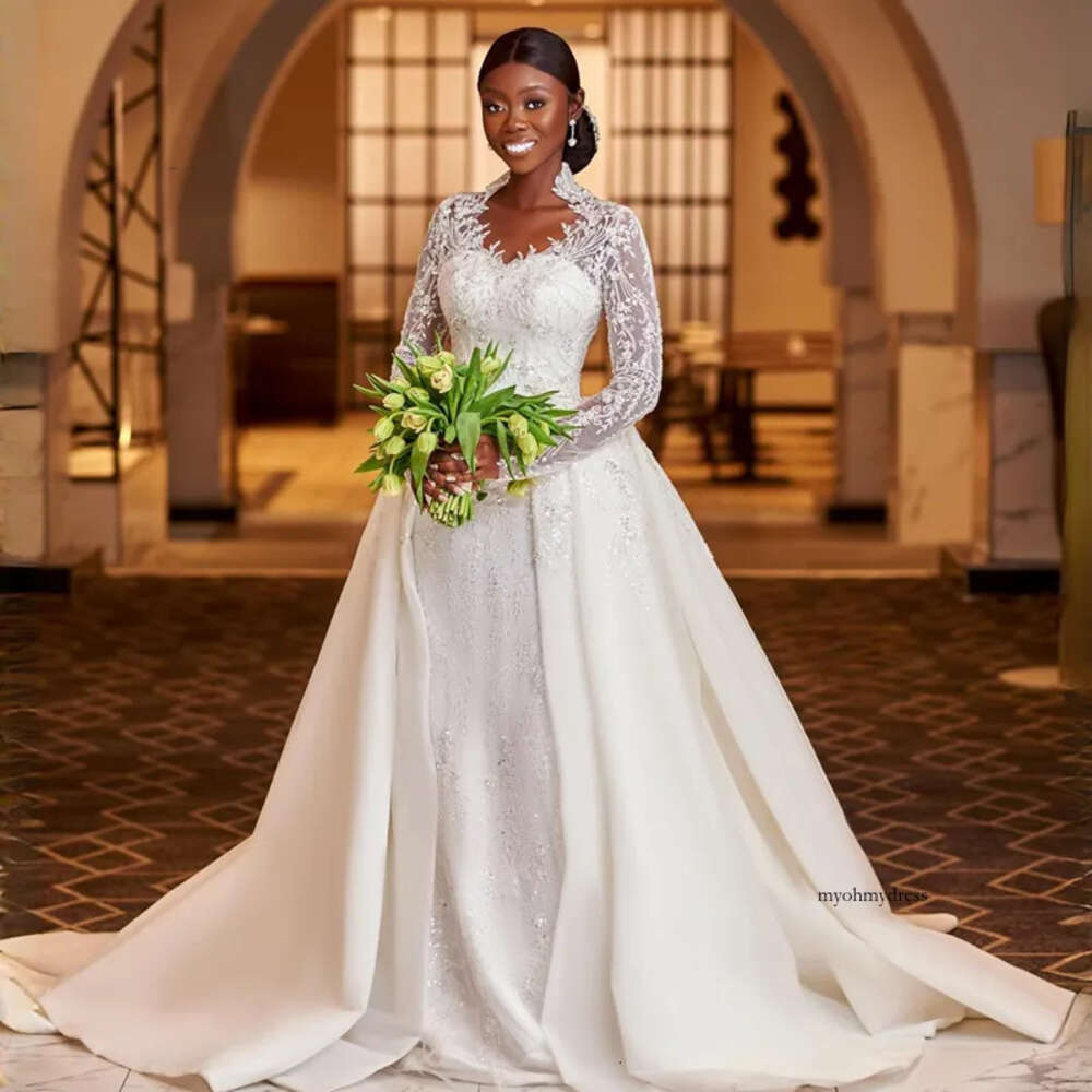 2024 African Sexy Mermaid Wedding Dresses Bridal Gowns Illusion Sweetheart Long Sleeves Lace Appliques Crystal Beads Chapel Overskirt Detachable Train