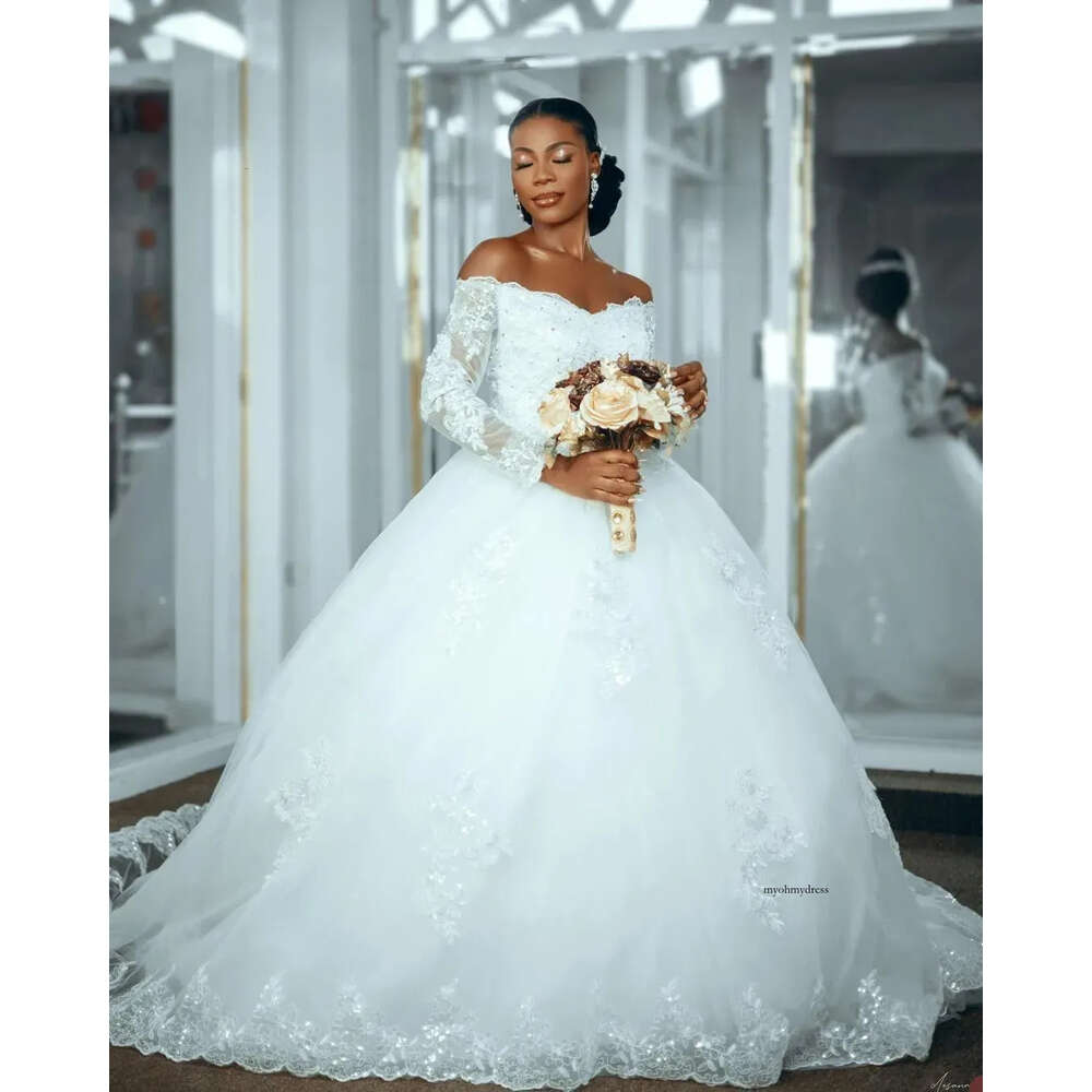 2024 African A Line Wedding Dresses Off Shoulder Long Sleeves Lace Appliques Crystal Beads Sequins Sweep Train Sexy Bridal Gowns 0513