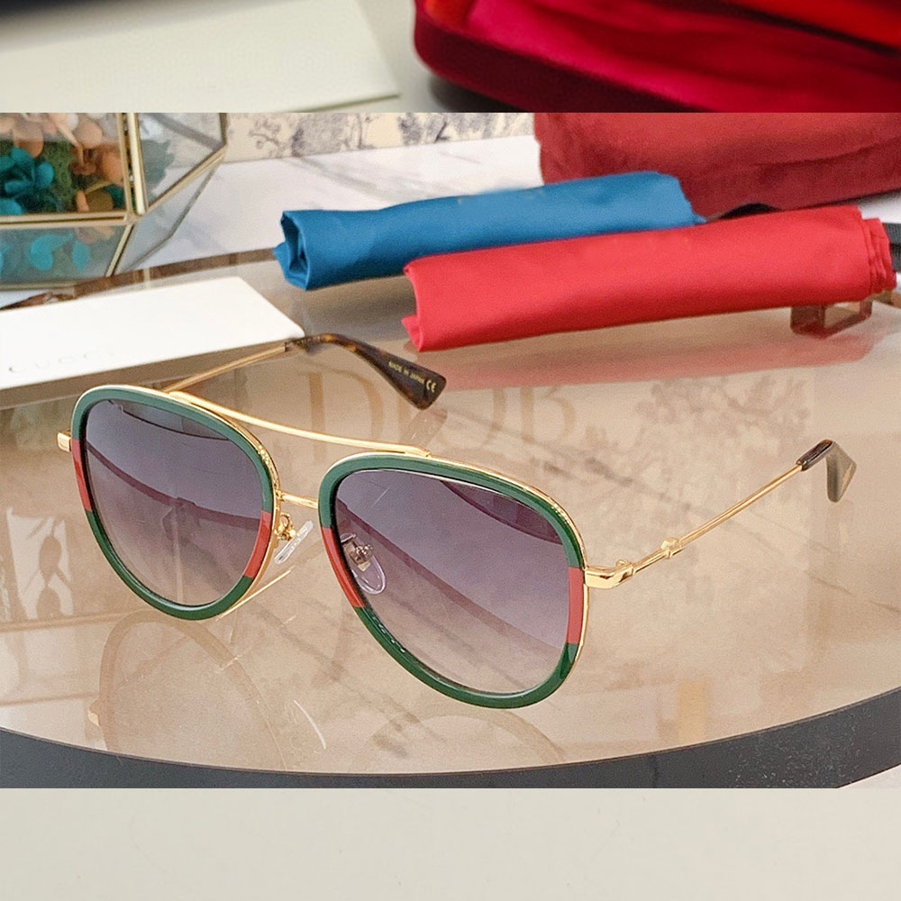 Designer metal sunglasses Gold metal with green red Web frame Green shaded lens 100% UVA/UVB protection Luxury sunglasses 0062