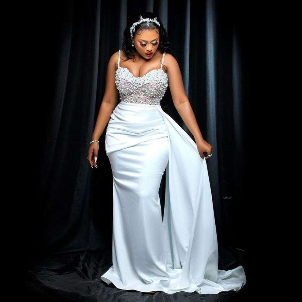 Aso Ebi Pearls Beaded Wedding Dresses 2023 Sexy Spaghetti Straps Satin Mermaid Bridal Gowns African Sweep Train Vestidos