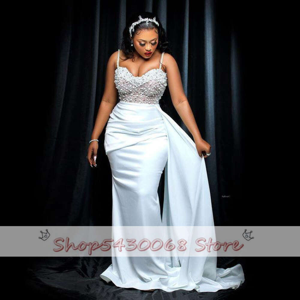 Aso Ebi Pearls Beaded Wedding Dresses 2023 Sexy Spaghetti Straps Satin Mermaid Bridal Gowns African Sweep Train Vestidos