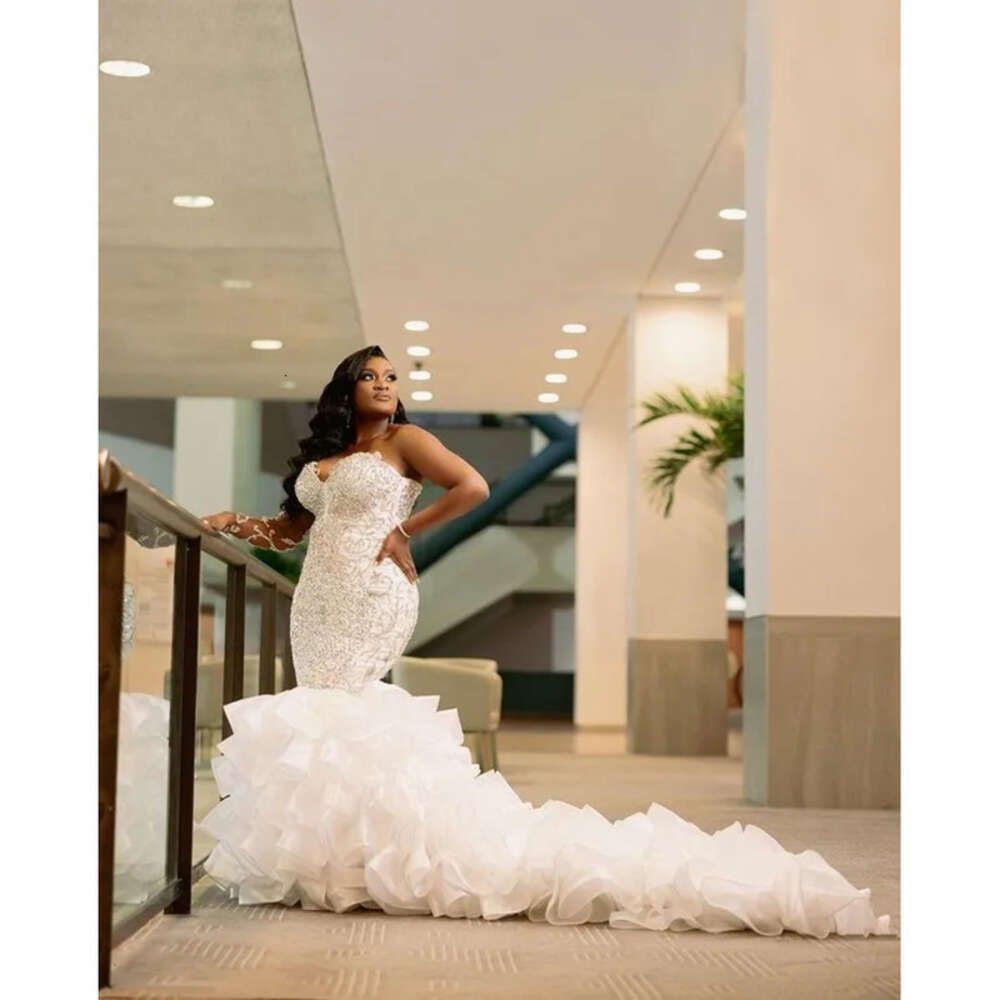 Sexy African Mermaid Wedding Dresses Formal Bridal Dress Jewel Neck Illusion Crystal Beaded Plus Size Ruffles Tiered Cathedral Train Long Sleeves 0227