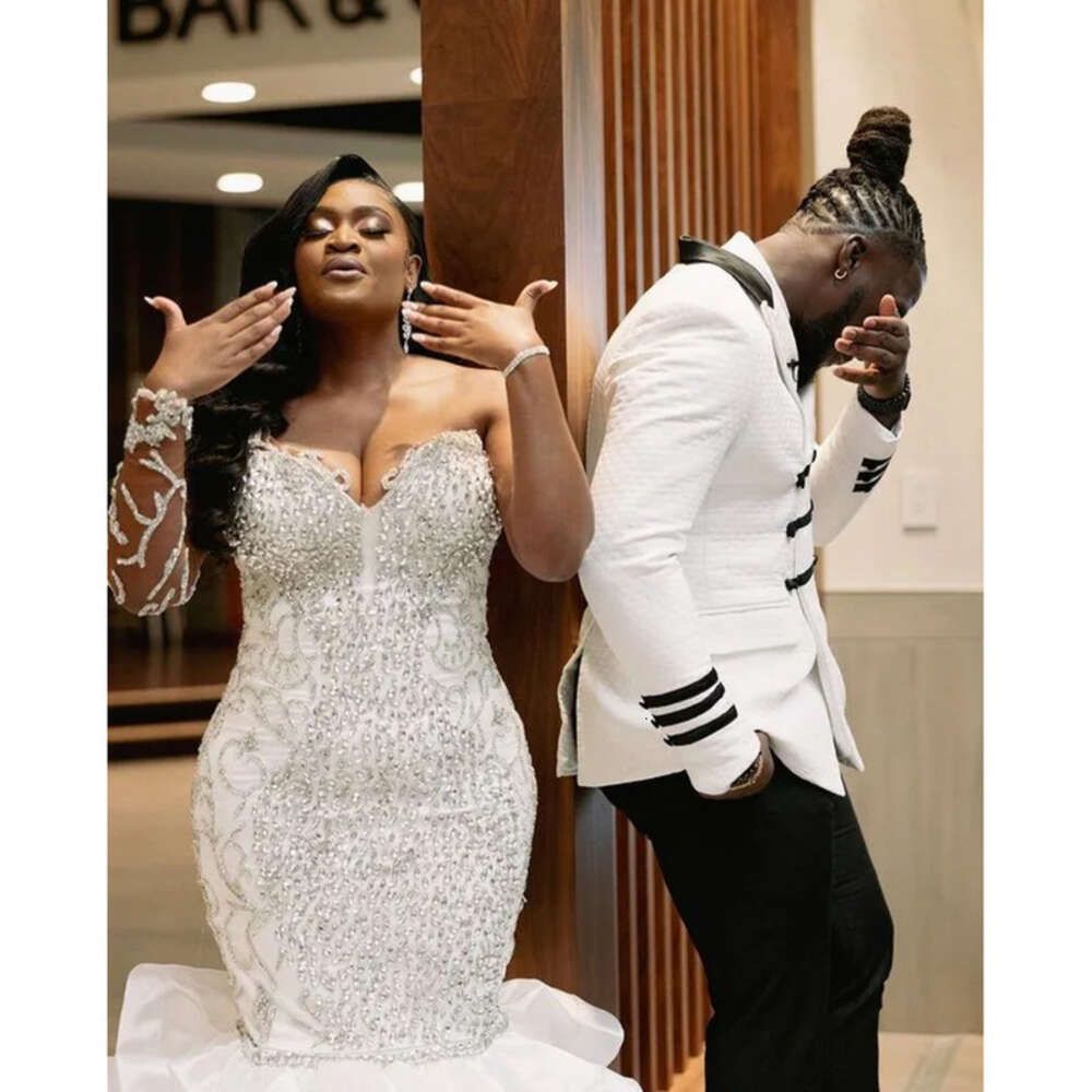 Sexy African Mermaid Wedding Dresses Formal Bridal Dress Jewel Neck Illusion Crystal Beaded Plus Size Ruffles Tiered Cathedral Train Long Sleeves 0227