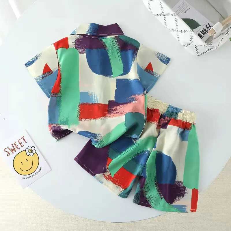 Clothing Sets Summer baby girl and boy clothing childrens printed lapel shirt short sleeved top and top 2-piece set of childrens beach clothes WX