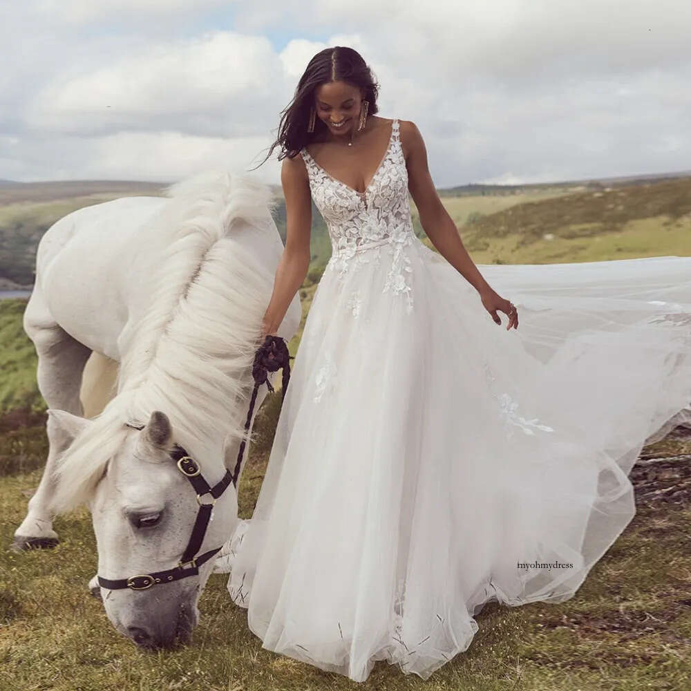 Chic Backless A Line Wedding Dresses Lace Appliques V Neck Boho Bridal Dress Ribbon Belt Sweep Train Robe De Mariee 0516