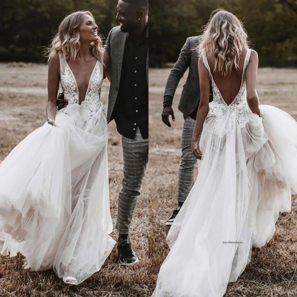 Boho A Line Wedding Dresses Plunging V Neck Lace Appliques Backless Tulle Designer Biohemia Wedding Bridal Gowns 0516