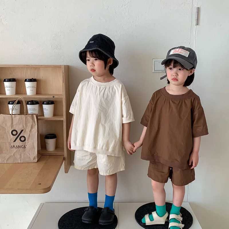 Clothing Sets Summer childrens clothing set for boys and girls simple loose cotton short sleeved shorts set 2-piece childrens clothing WX