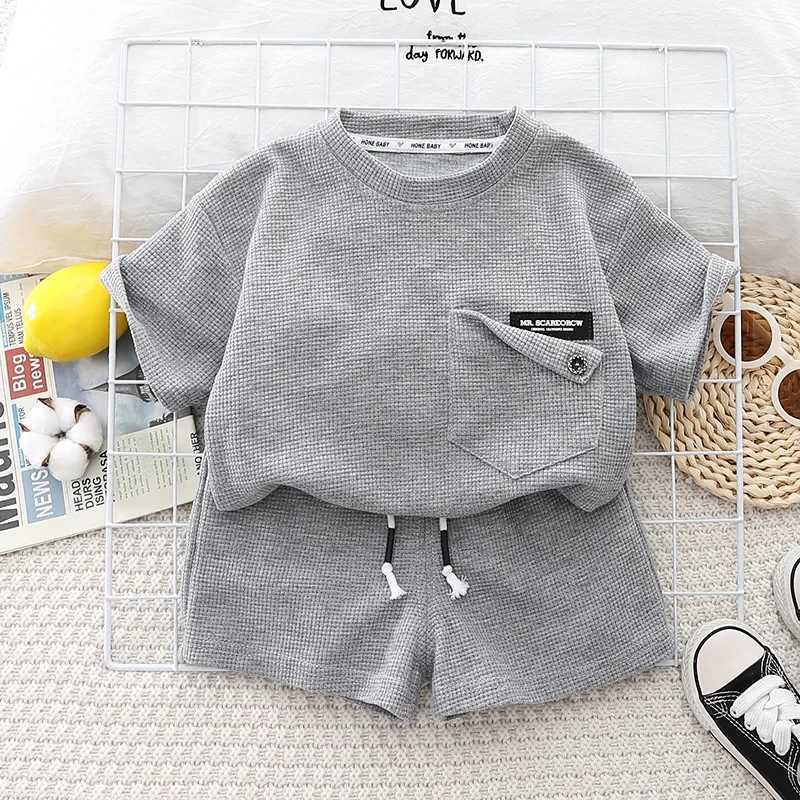 Clothing Sets 2024 Baby Fashion Boys and Girls Clothing Set Childrens Short sleeved T-shirt Shorts Summer Clothing Childrens Cotton Loose 2PCS 1-5Y WX