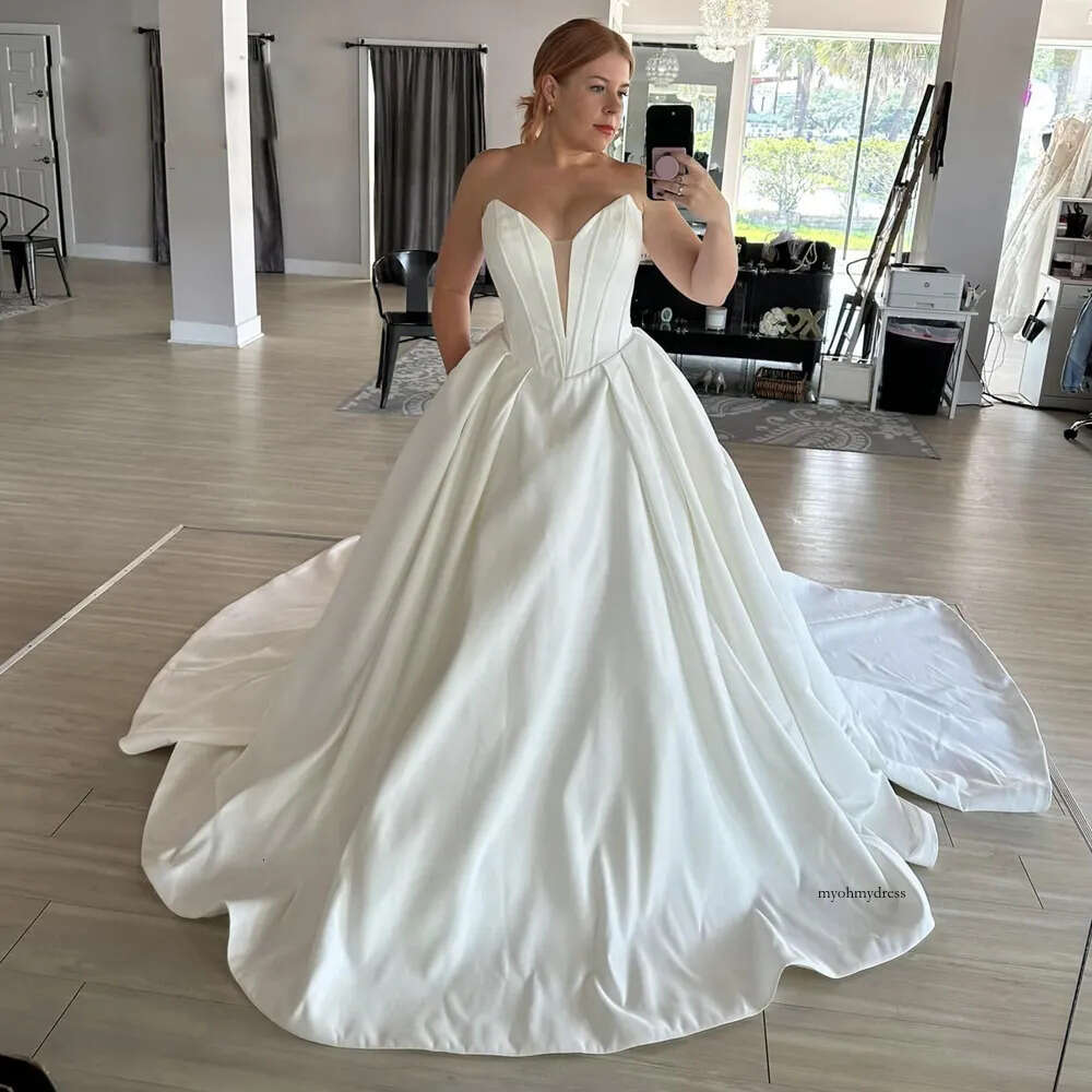 Modern Deep V Neck Puffy Wedding Dresses Corset Top Ruched Satin Bridal Dress Plus Size Draped Overskirt Bride Robe De Mariage 0516