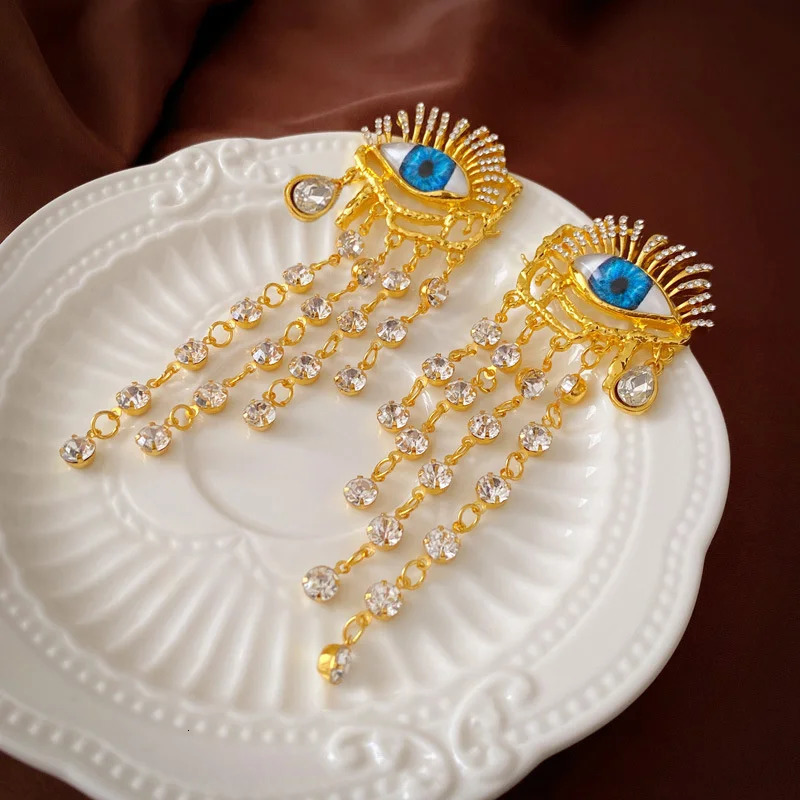 XIALUOKE Devil Eye Earrings Women European American Style Personality Crystal Tassel Dangle Earrings Party Halloween Jewelry 240430