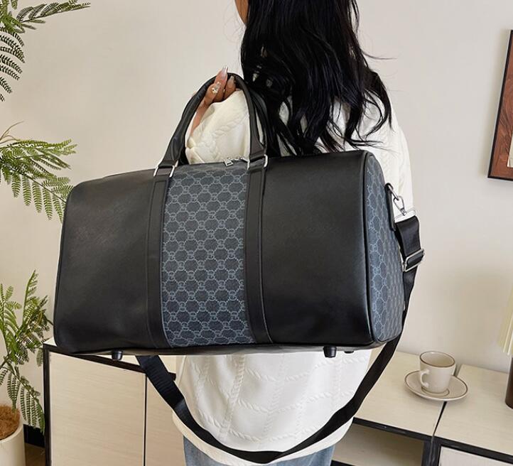 55cm designer duffle bag Men pu leather women fashion travel bag Large capacity Zipper coated canvas hand bill shoulder crossbody travel bag