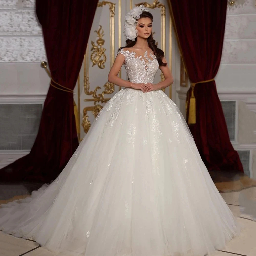 2024 Princess Long Tulle A Line Wedding Dresses Lace Appliques Sleeveless Crew Neck Back Buttons Elegant Bridal Gowns Court Train Ivory White Long Ves