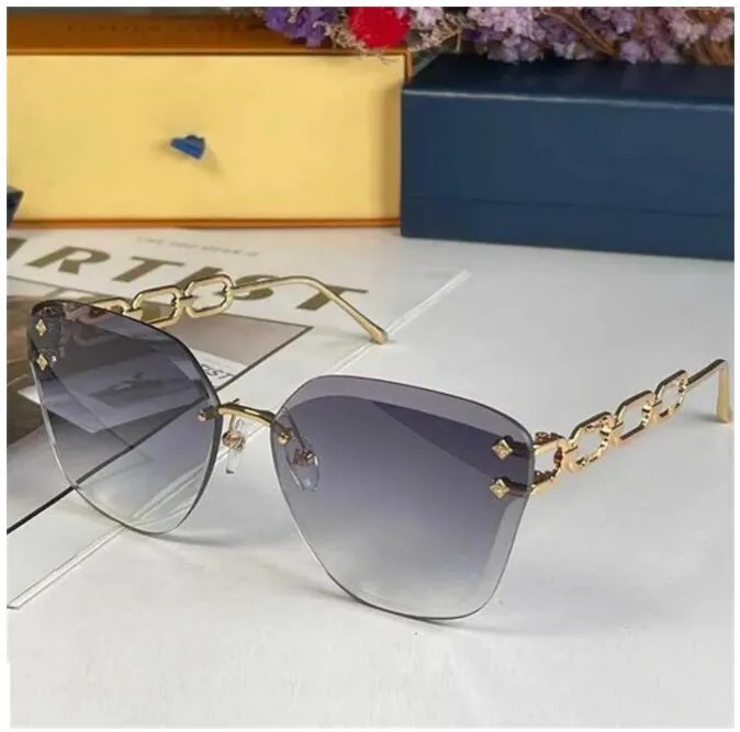 NEW JEWEL cat eye sunglasse luxury brand designer rimles gradient lens temple with classic logo female personality all-match glasses
