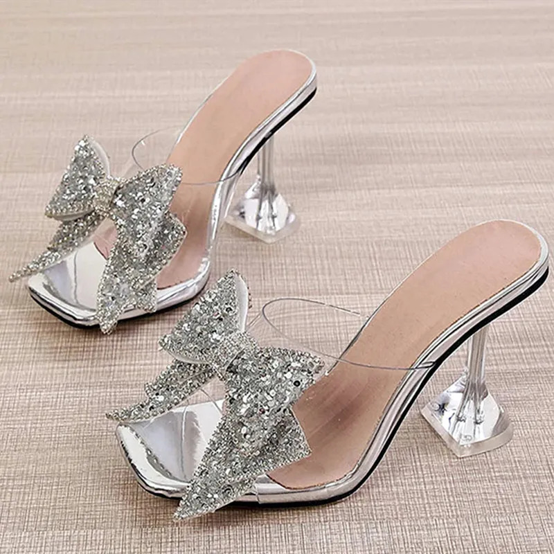 New 2024 Fashion Sier Crystal Bow Knot Shoes Womens Transparent Mule Slide Summer High Heel Sandals 240517