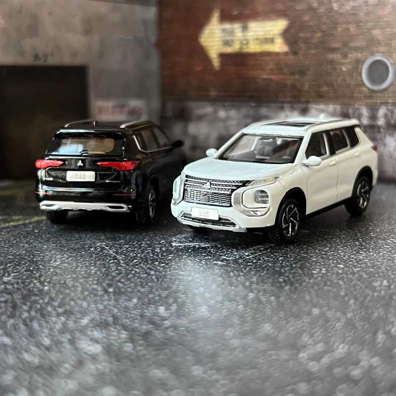 Free shipping Diecast Cars 1/64 Mitsubishis Outlander SUV Alloy Diecasts Metal Toy Vehicles Car Model Miniature Scale Childrens Gifts Decorations