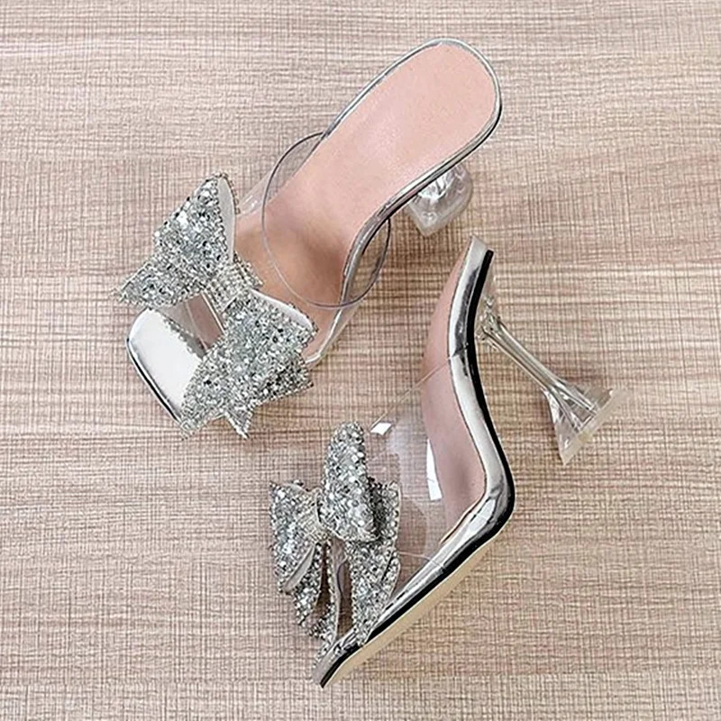 New 2024 Fashion Sier Crystal Bow Knot Shoes Womens Transparent Mule Slide Summer High Heel Sandals 240517