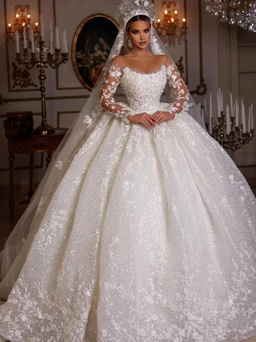 Women's 2025 Lace Wedding Dresses Dubai Long Sleeves Sequins Beads Sheer Neck Appliques Glitter Tulle Bride Gowns new Vestido Noiv