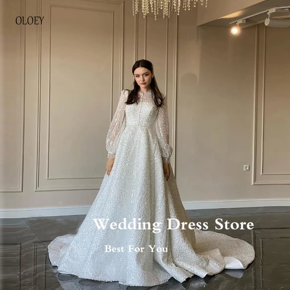 Modest OLOEY 2023 Glitter Puff Long Sleeves Wedding Dresses High Neck Buttons Front Sweep Train Dubai Women Bridal Gowns smile