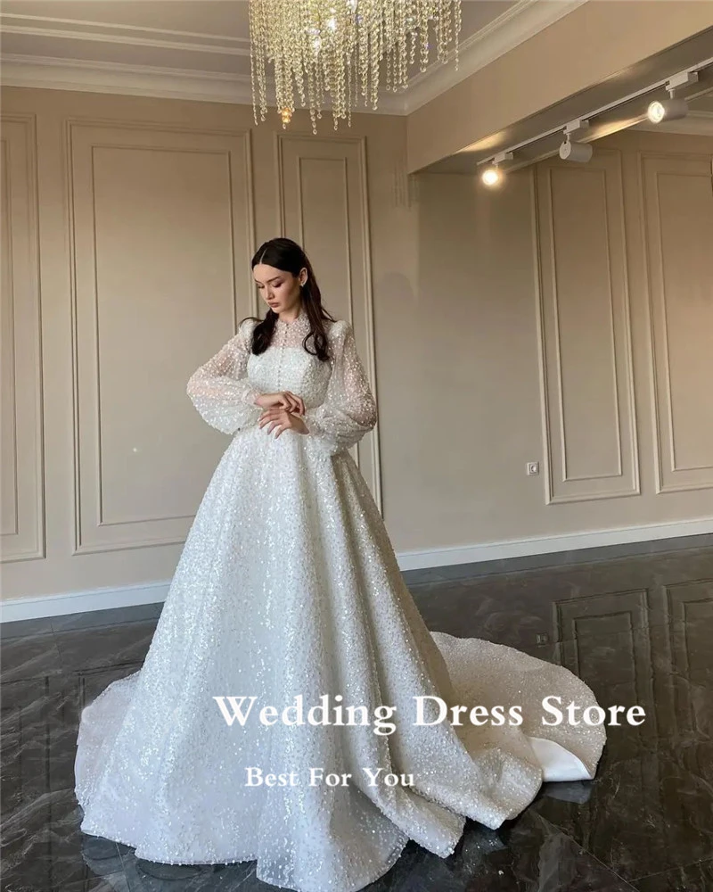 Modest OLOEY 2023 Glitter Puff Long Sleeves Wedding Dresses High Neck Buttons Front Sweep Train Dubai Women Bridal Gowns smile