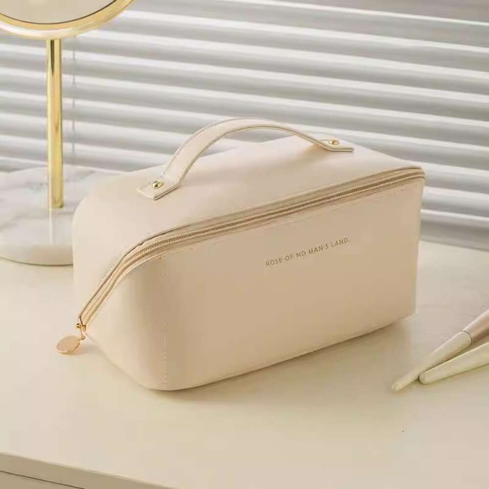 2024 Cosmetic storage bag Free shipping New Design PU Leather Portable Women Makeup Minimalist style Fashion Good texture Great for gifts Triple Pink 