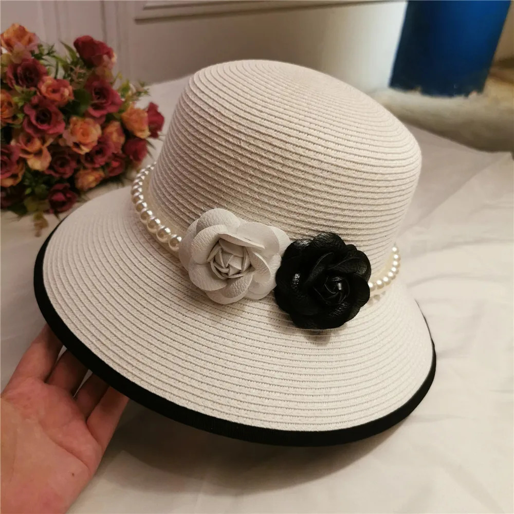 French retro elegant straw hat Hepburn pearl flower fisherman hat seaside holiday beach hat sunshade sunblock hat lady 240528