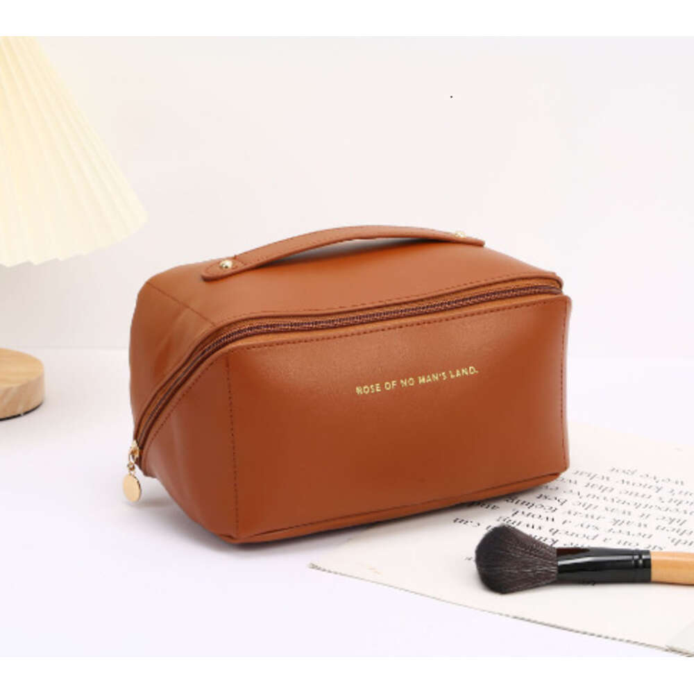 2024 Cosmetic storage bag Free shipping New Design PU Leather Portable Women Makeup Minimalist style Fashion Good texture Great for gifts Triple Pink 