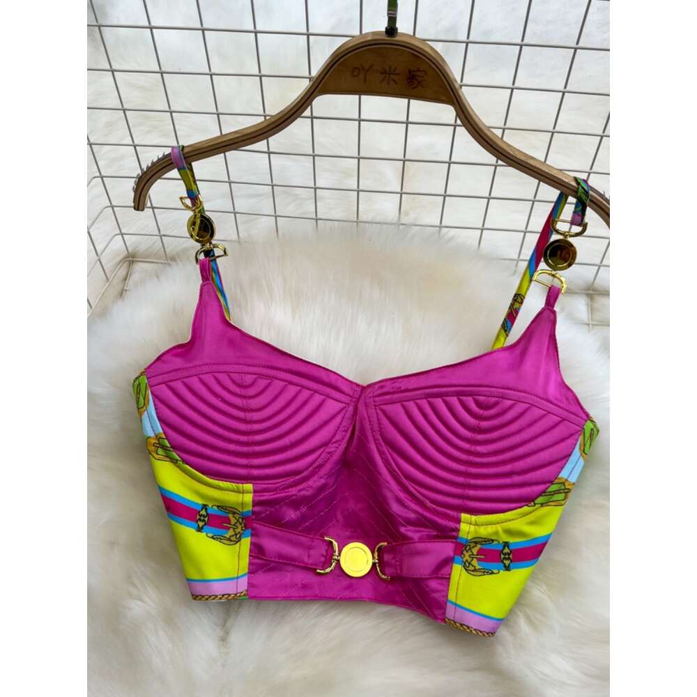 Beach vacation fashion suit for women with chest pads camisole and tank top wearing a high waisted A-line printed pleated skirt for women