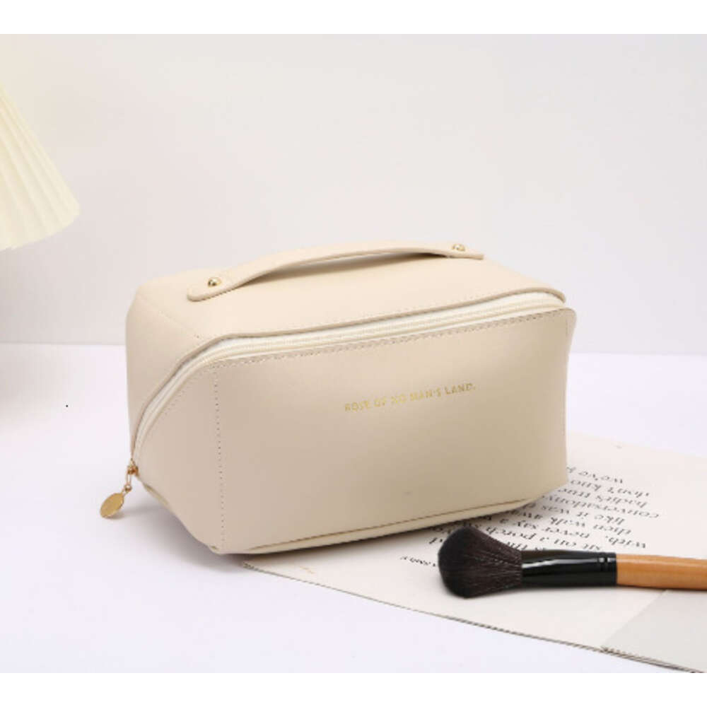 2024 Cosmetic storage bag Free shipping New Design PU Leather Portable Women Makeup Minimalist style Fashion Good texture Great for gifts Triple Pink 