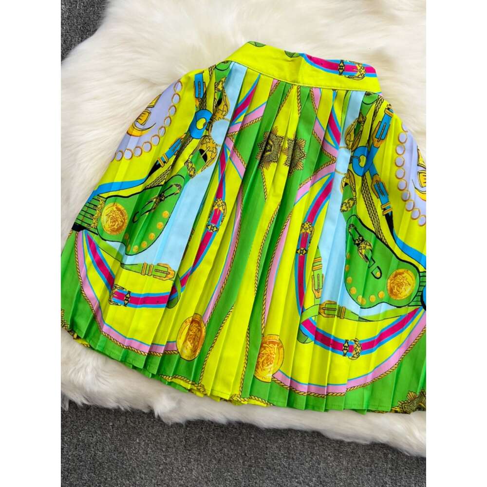 Beach vacation fashion suit for women with chest pads camisole and tank top wearing a high waisted A-line printed pleated skirt for women