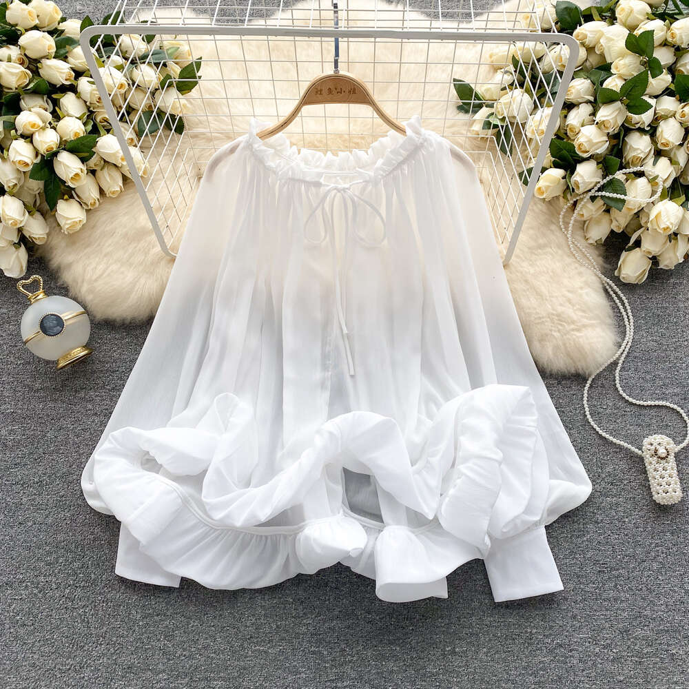 French haute couture temperament lantern long sleeved lace up loose ruffle hem shirt for womens fashionable and unique niche top