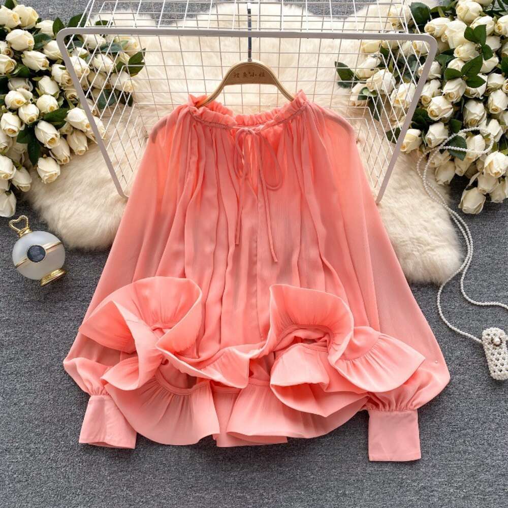 French haute couture temperament lantern long sleeved lace up loose ruffle hem shirt for womens fashionable and unique niche top