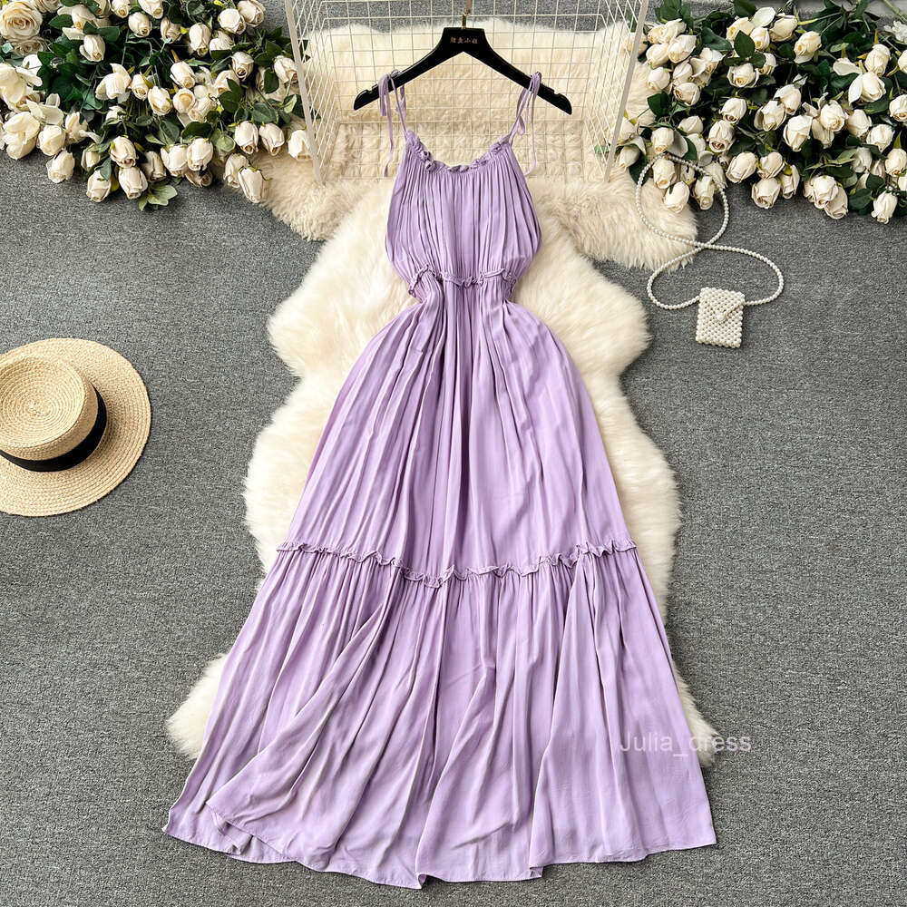 Purple dress for women in summer 2024 new seaside vacation travel photo taking and wearing high-end camisole fairy dress