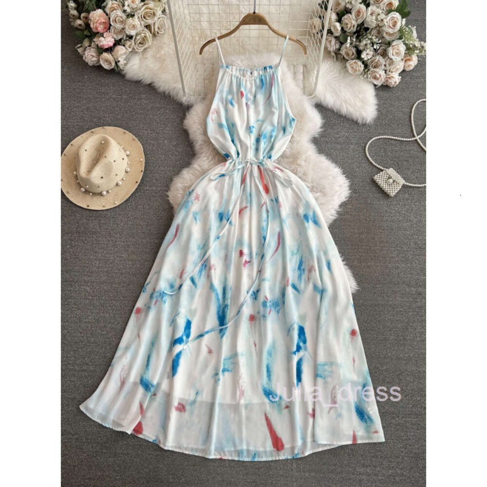 Gentle and socialite temperament slim waist mid length A-line printed strap dress seaside vacation beach skirt