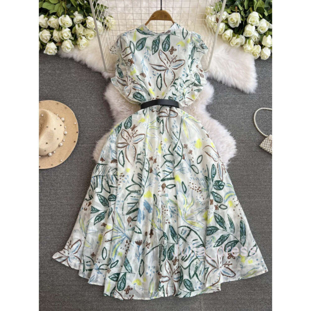 Fashionable socialite temperament formal occasion short sleeved stand up collar with ruffled edges and waist cinching A-line green printed dress